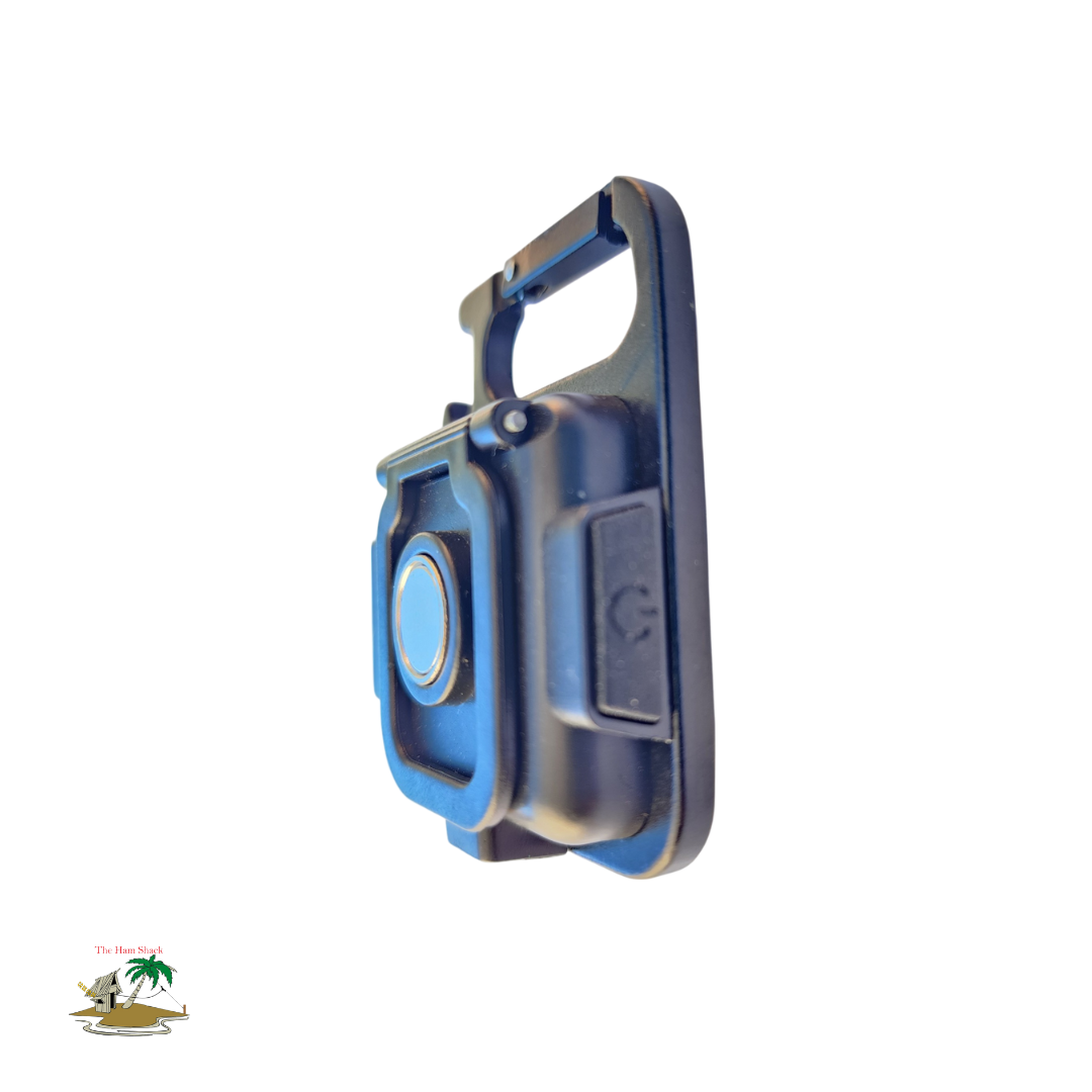 Side view of the Mini Magnetic Light COB L.E.D showing the power buttong and a close up of the clip which can be used to attach this to a belt look or other things 