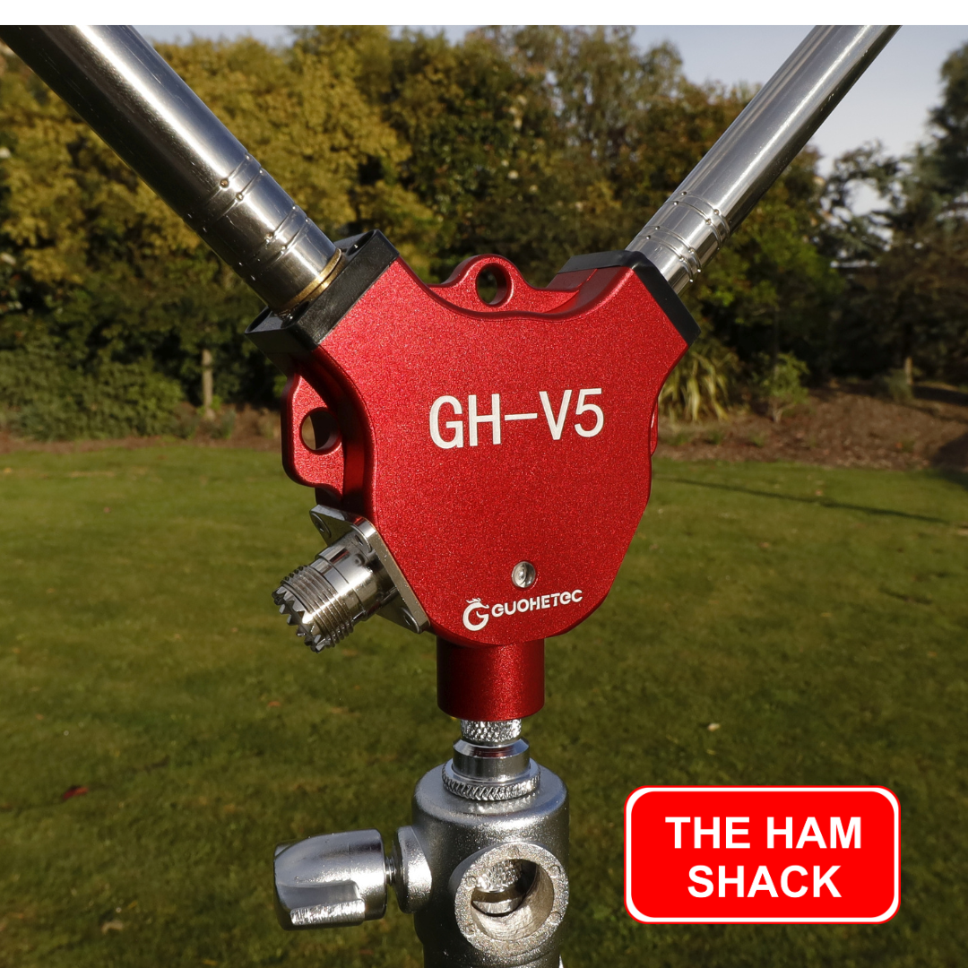 A view of the The GH-V5 Portable HF Antenna with a close up view of the Red Casing and attachment points with the two antenna poles extended 
